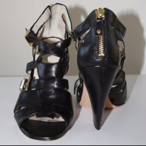 Black high heel strappy shoes, back zip